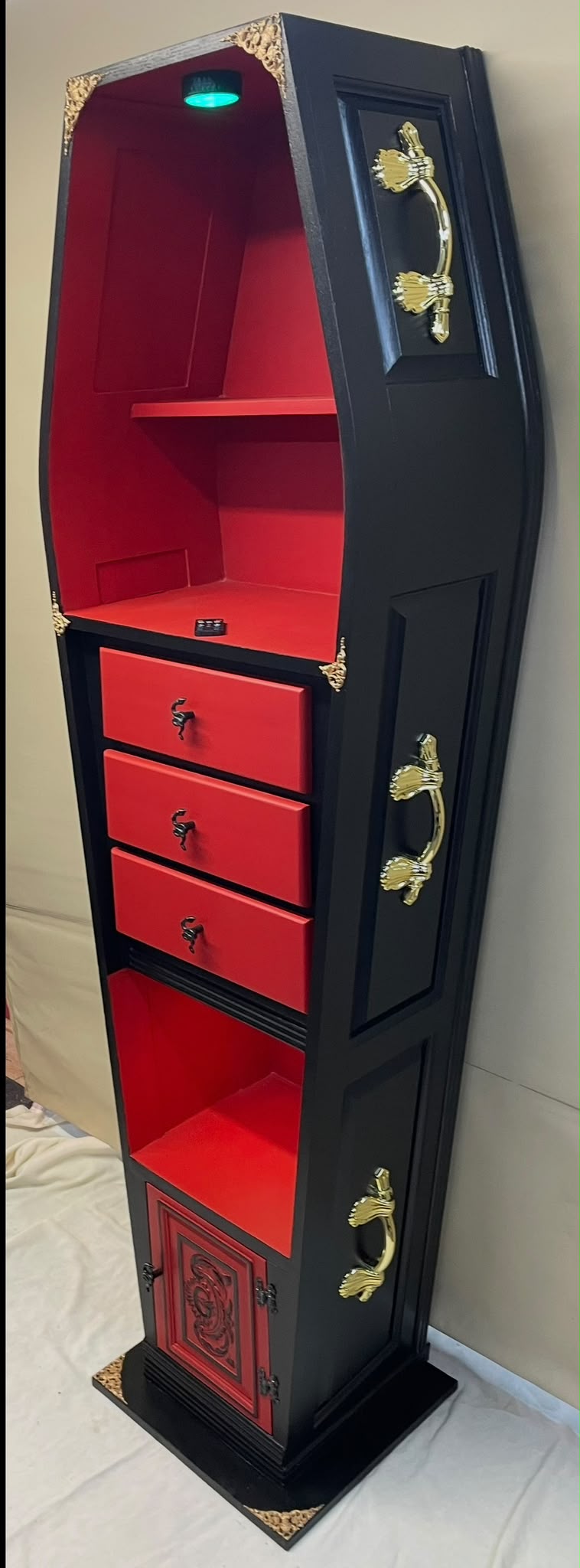 Red and black coffin shelving
