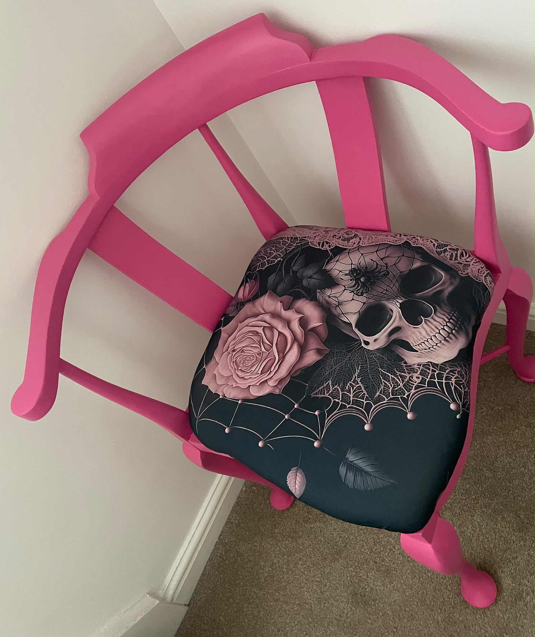 Pink skull corner chair currently for sale
